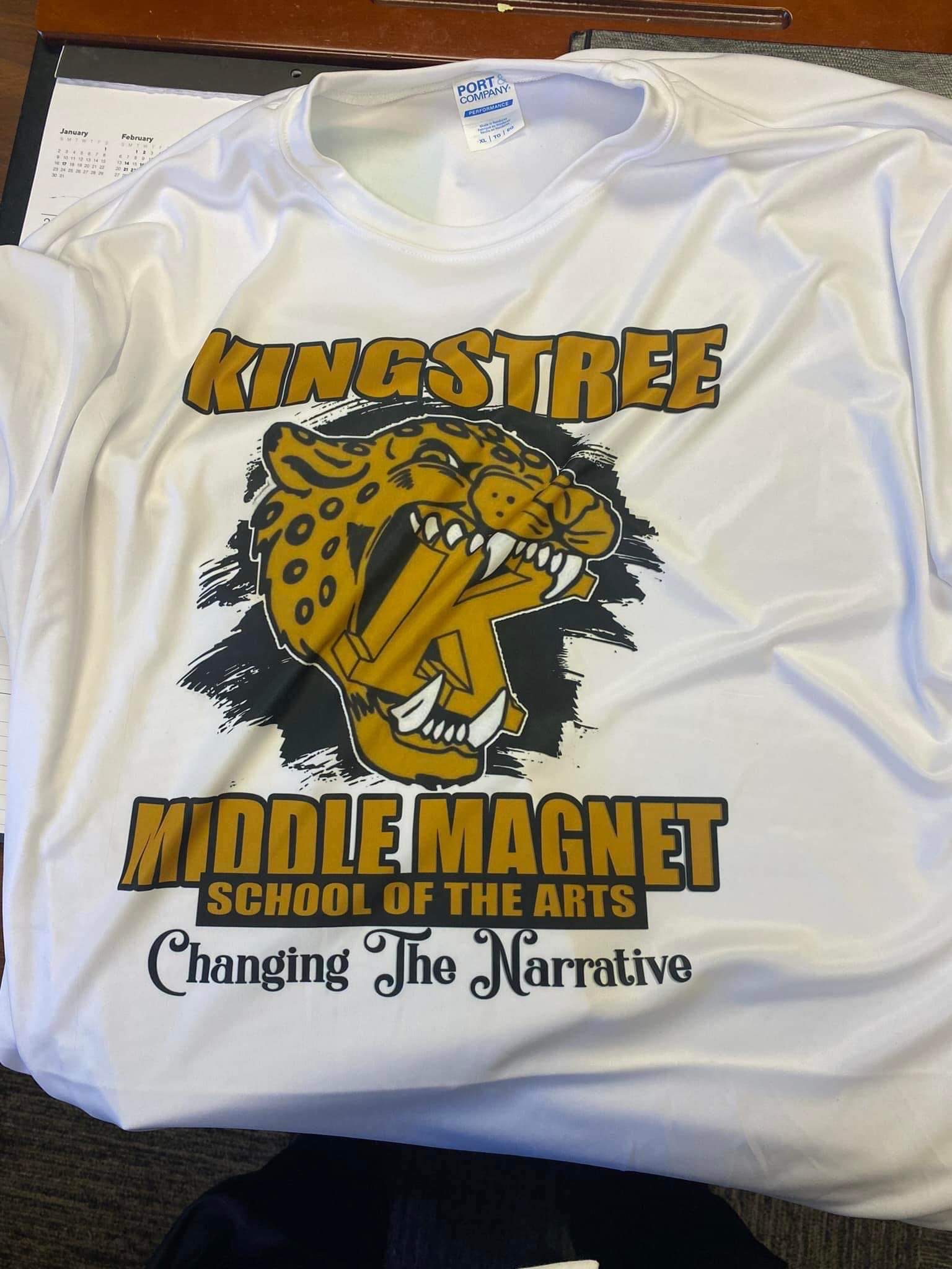 Trying to Identify Font on Bottom Of Shirt